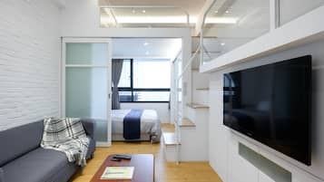 1 bedroom, desk, iron/ironing board, travel crib