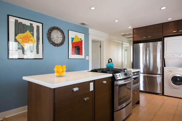 Fully upgraded kitchen with stone surfaces, stainless steel appliances etc.