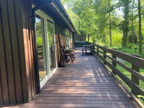 Outdoor dining - Berneray is a charming cabin in a beautiful setting, deep in the forest. (Taynuilt)