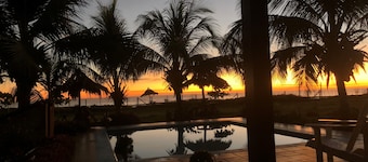 Relax in Style – 2BR Beachfront with Pool at Playa Tesoro