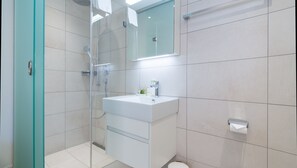 Bathtub, hair dryer, towels