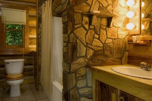 Combined shower/bathtub, hair dryer, towels, soap