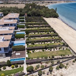 On the beach, beach cabanas, sun-loungers, beach umbrellas