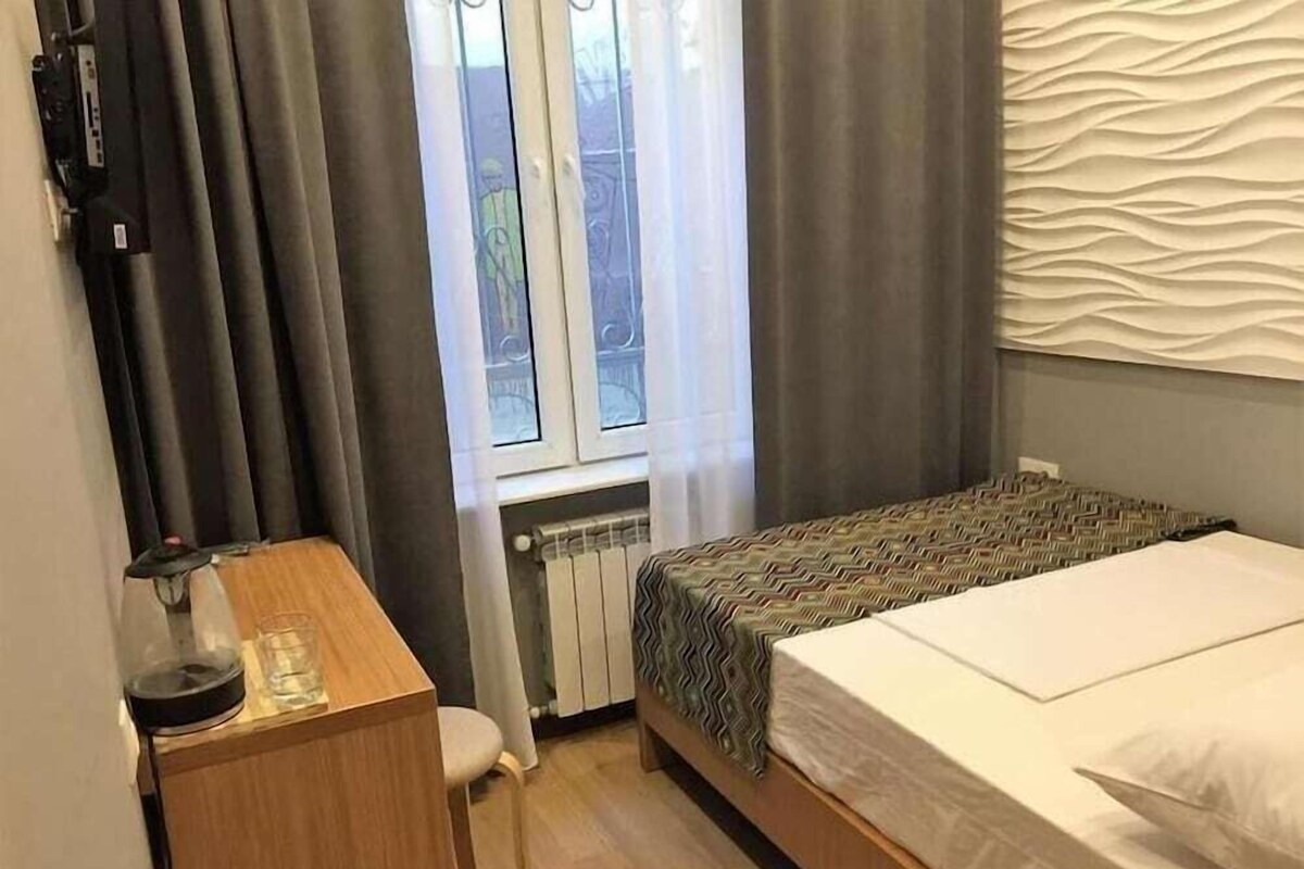 Desk, laptop workspace, blackout curtains, soundproofing
