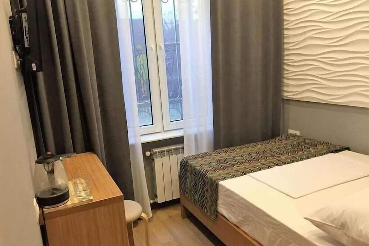 Desk, laptop workspace, blackout curtains, soundproofing