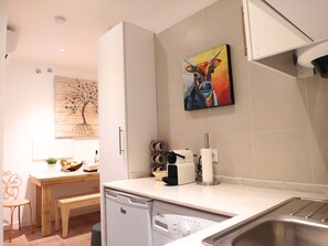 Fridge, microwave, coffee/tea maker, toaster