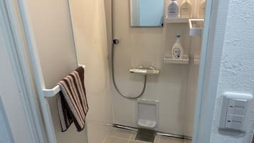 Hair dryer, towels, soap, shampoo
