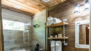 Combined shower/tub, hair dryer, towels, soap