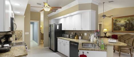 Microwave, dishwasher, coffee/tea maker, cookware/dishes/utensils