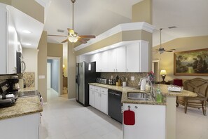 Microwave, dishwasher, coffee/tea maker, cookware/dishes/utensils