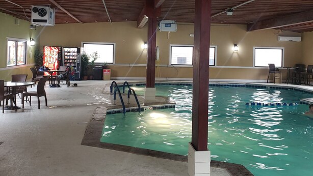 An indoor swimming pool with a wooden ceiling and a no smoking sign. - Last MINUTE CANCELLATION- 8/1-8/8 NOW $2200.00 2BR/2BA @ CLUB OCEAN VILLAS II (Ocean City)