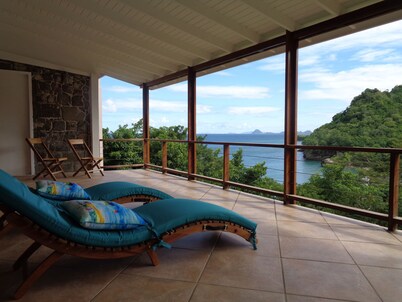 Secluded villa overlooking black sand beach