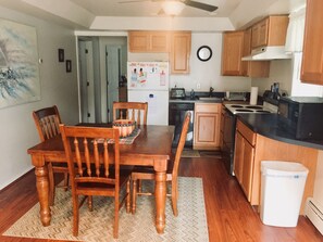 Microwave, dishwasher, coffee/tea maker, cookware/dishes/utensils