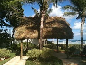 Escape to a serene oasis surrounded by lush greenery and a tranquil atmosphere.