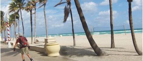 On the beach, sun-loungers