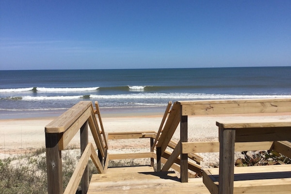 On the beach, sun-loungers, beach towels