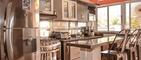 Fridge, microwave, stovetop, coffee/tea maker