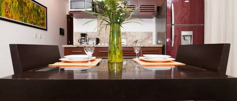 Fridge, microwave, stovetop, coffee/tea maker