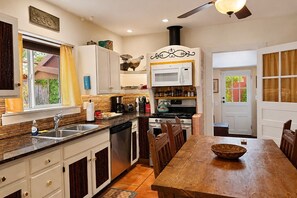 Coffee/tea maker, fridge, microwave, oven