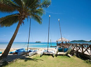 On the beach, sun-loungers, beach towels - Refreshing ocean waters! (Nadi)