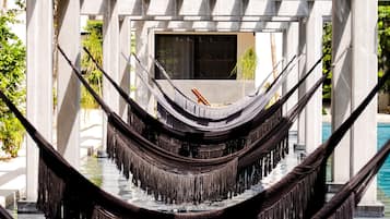 2 outdoor pools, open 9:00 AM to 10:00 PM, sun loungers