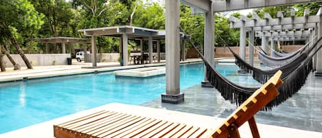 Family Suite, Pool View | Blackout drapes, free WiFi, bed sheets