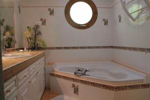 Bathtub, hair dryer, towels