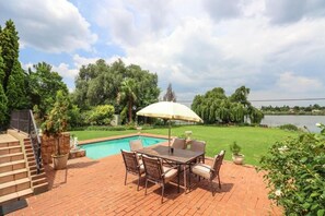 2 outdoor pools, pool umbrellas, pool loungers