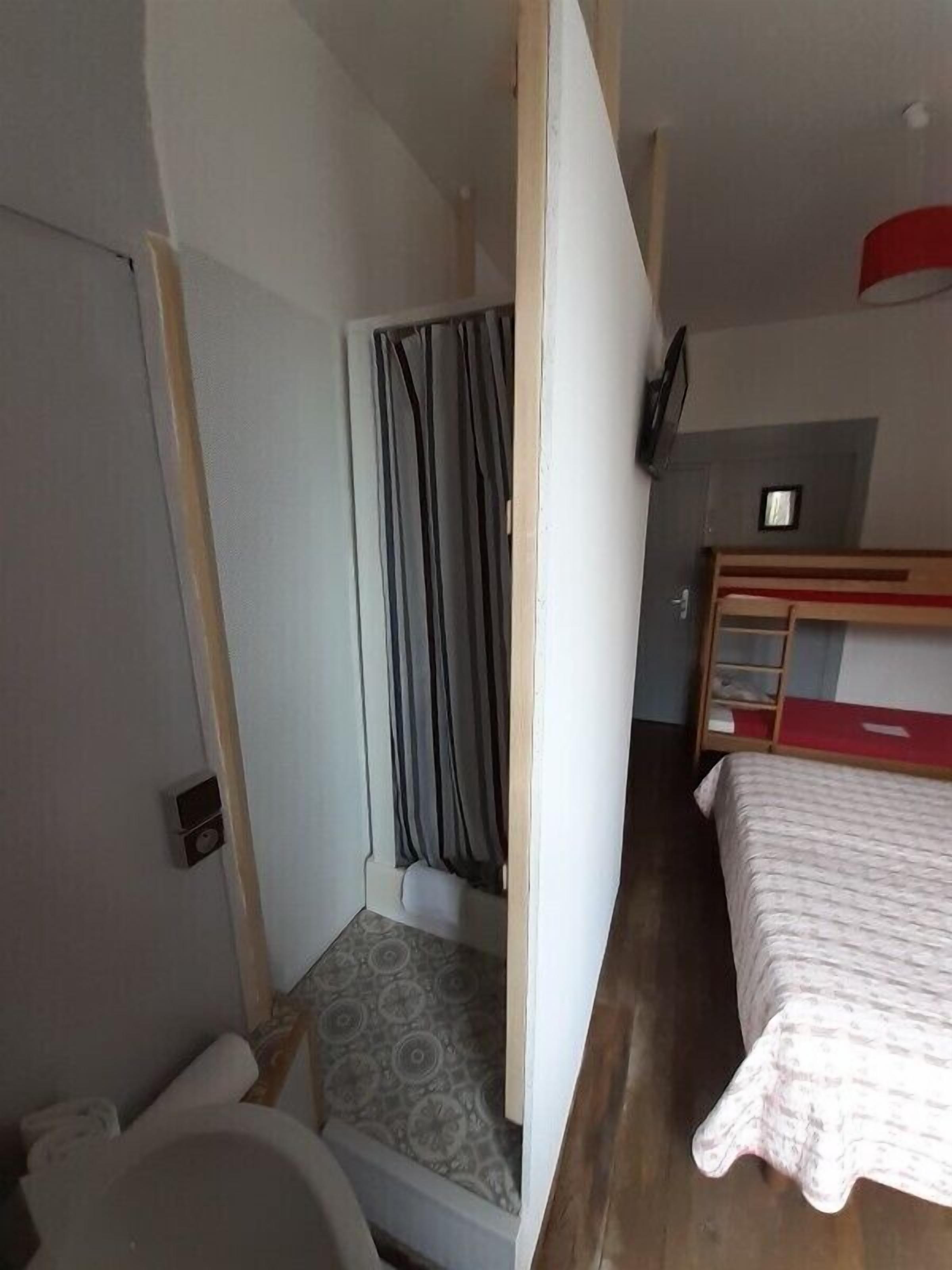 economy quadruple room, shared bathroom | bathroom | shower, towels, soap, shampoo