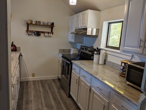 Refrigerador, microondas, horno, placa de cocina