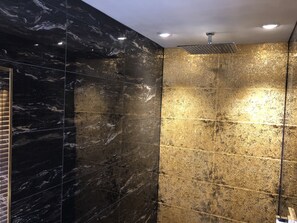 Shower, towels, soap, toilet paper