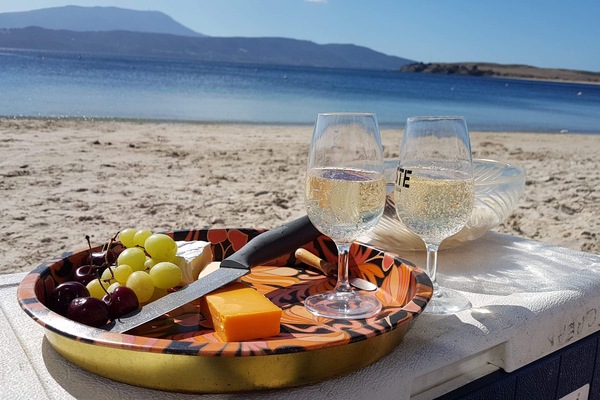 On the beach, sun loungers