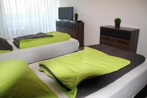 1 habitación, tabla de planchar con plancha, wifi y ropa de cama 