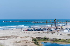 On the beach, sun loungers, beach towels