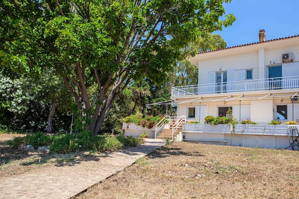 Ferienhaus mit Garten und Meerblick