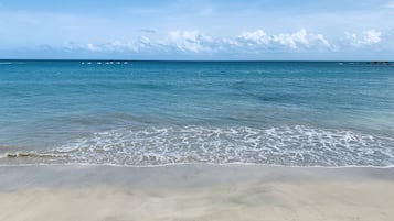 En la playa, toallas de playa