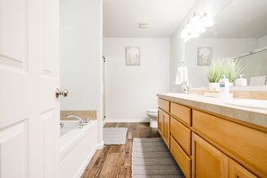Combined shower/tub, hair dryer, towels, soap