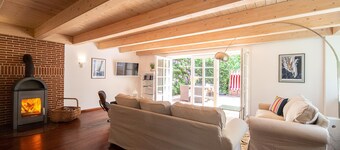 Thached roof house in Nebel on the island Amrum - located in the beautiful woods