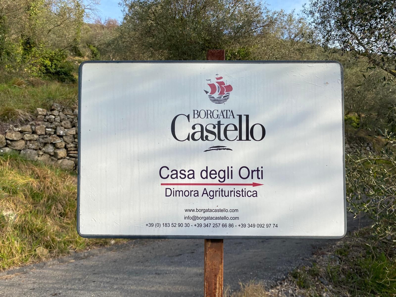 A sign for Borgata Castello, Casa degli Orti, a farm-style hotel.