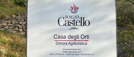 A sign for Borgata Castello, Casa degli Orti, a farm-style hotel.
