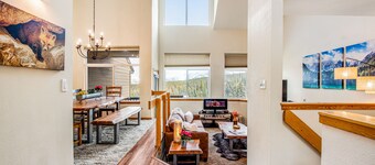 Home with hot tub, gas fireplace, and garage