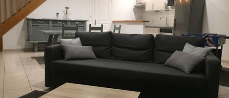 TV, DVD player, foosball, books