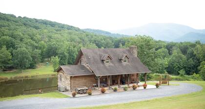 Rustic Log Lodge Overlooking Water and Mountain Views