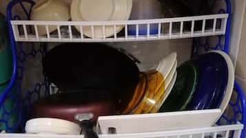 Fridge, stovetop, electric kettle, cookware/dishes/utensils
