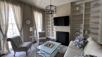 Smart TV, fireplace, books