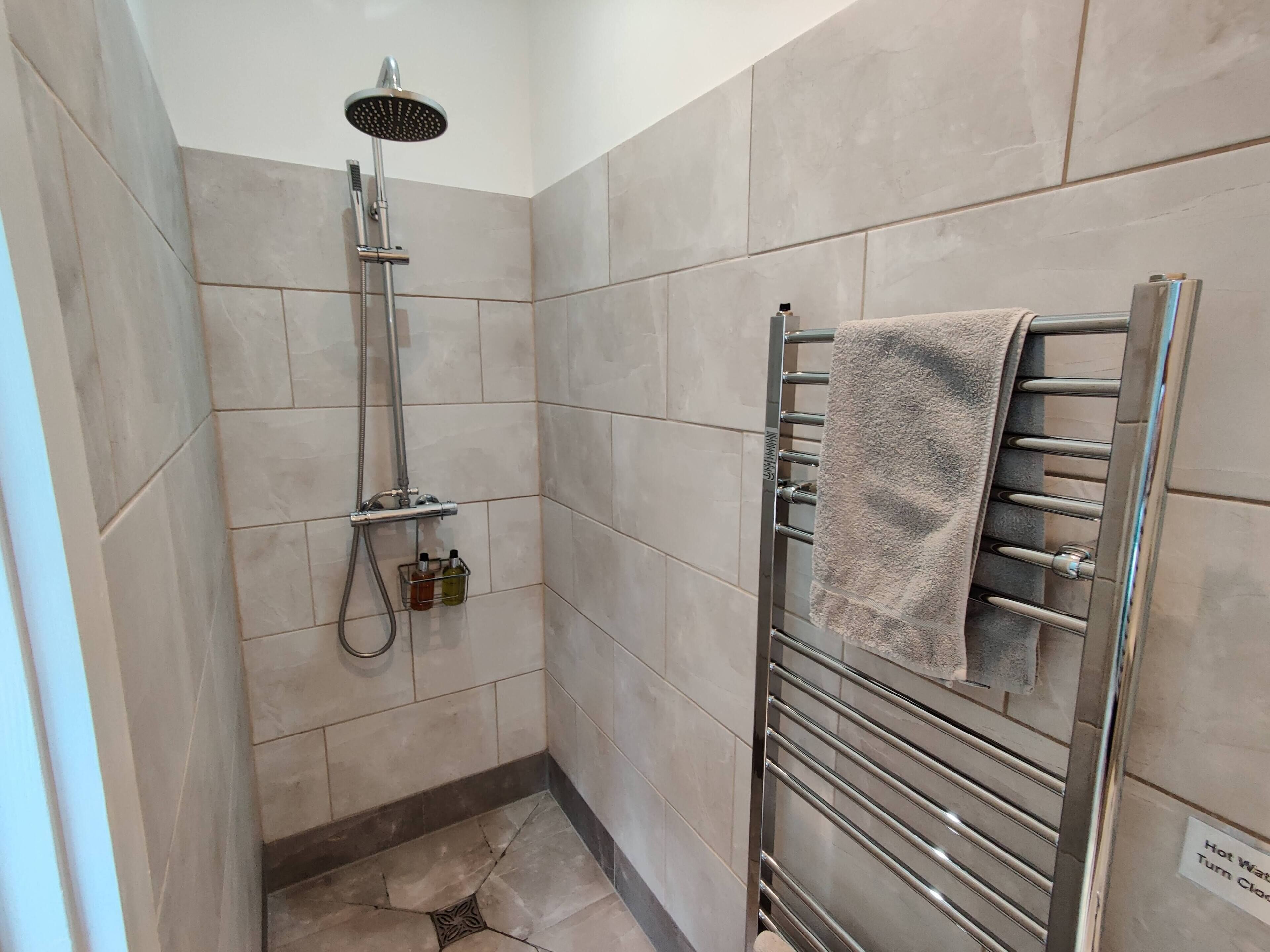 Shower, towels, soap, shampoo