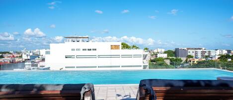 Outdoor pool, pool umbrellas, pool loungers