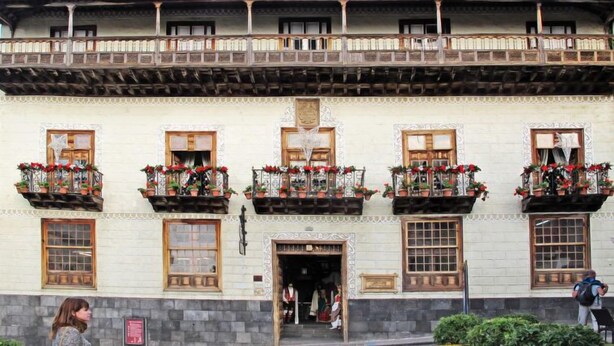 A traditional building with multiple balconies adorned with potted plants. - Camino La Candelaria by Interhome (La Orotava)