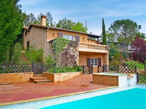 A two-story house with a swimming pool, surrounded by a garden and trees. - Fromental by Interhome (Bagnac)