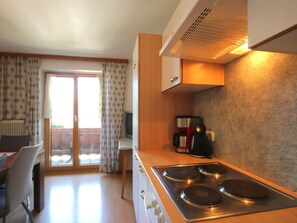 Fridge, oven, cookware/dishes/utensils